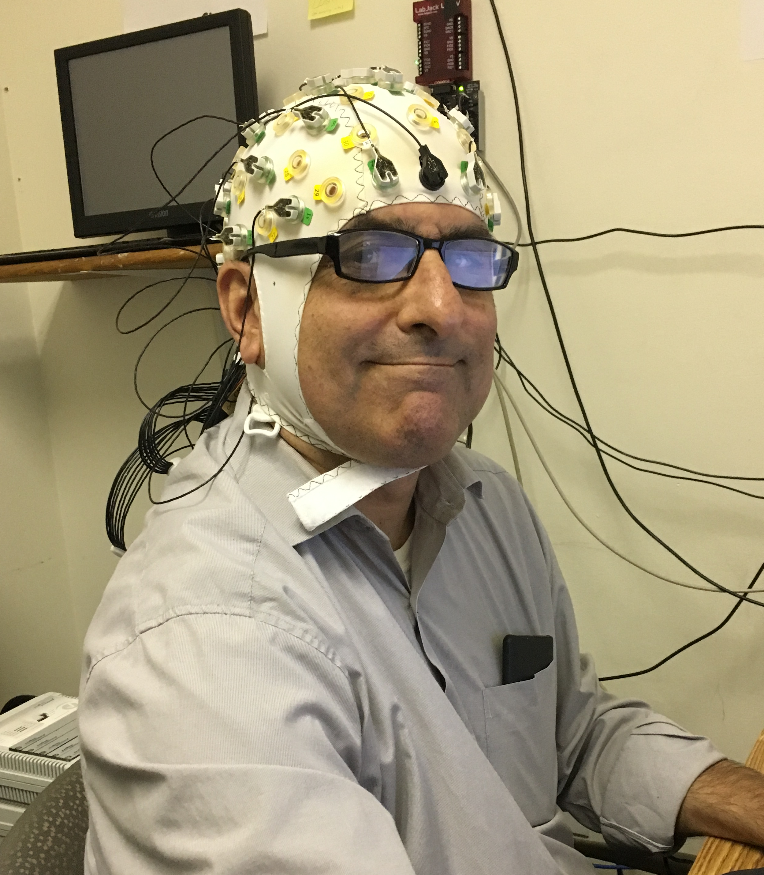 Dr. Amir doing EEG